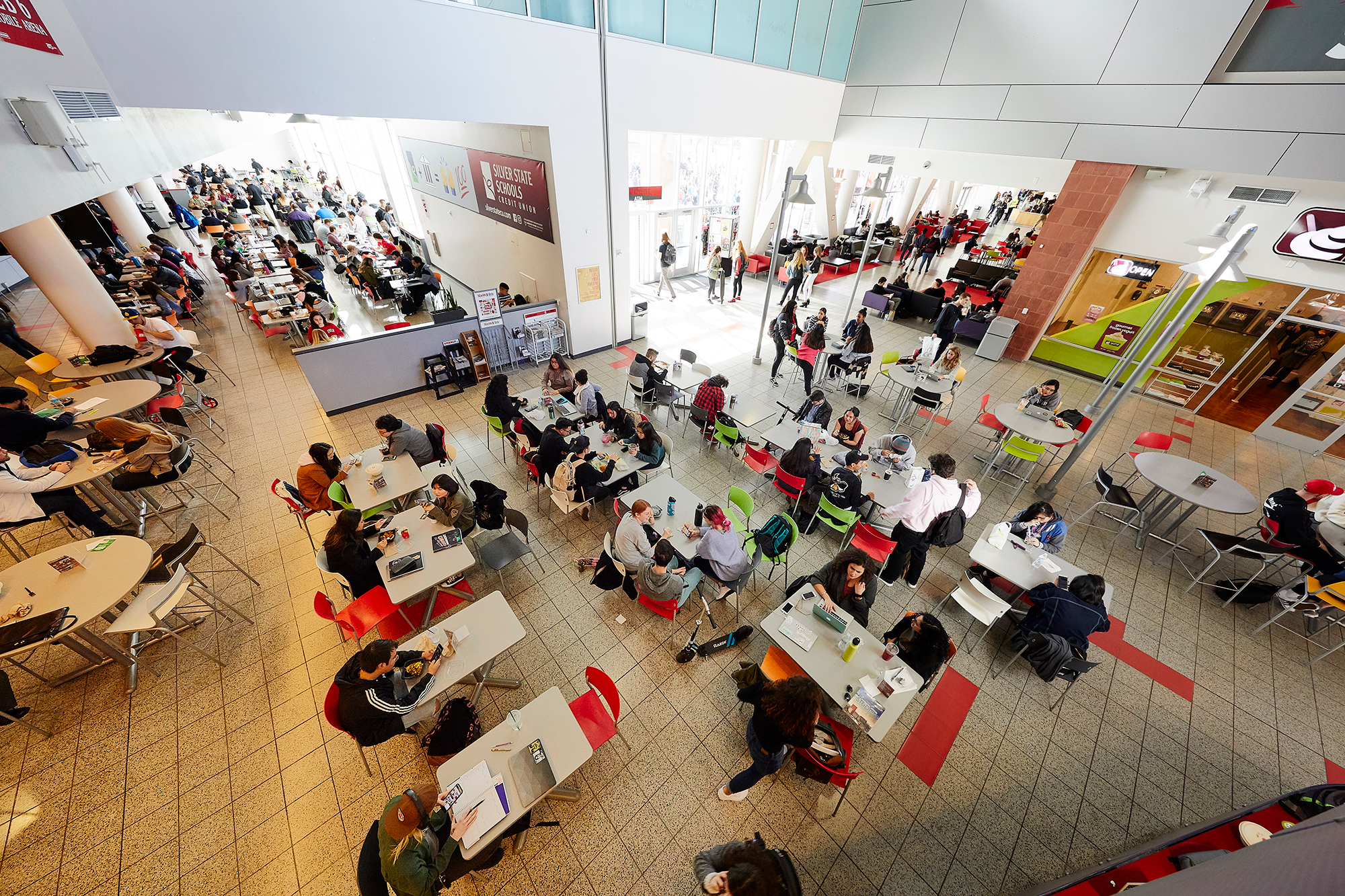 top view shot of the Student Union first floor and many students eating at tables