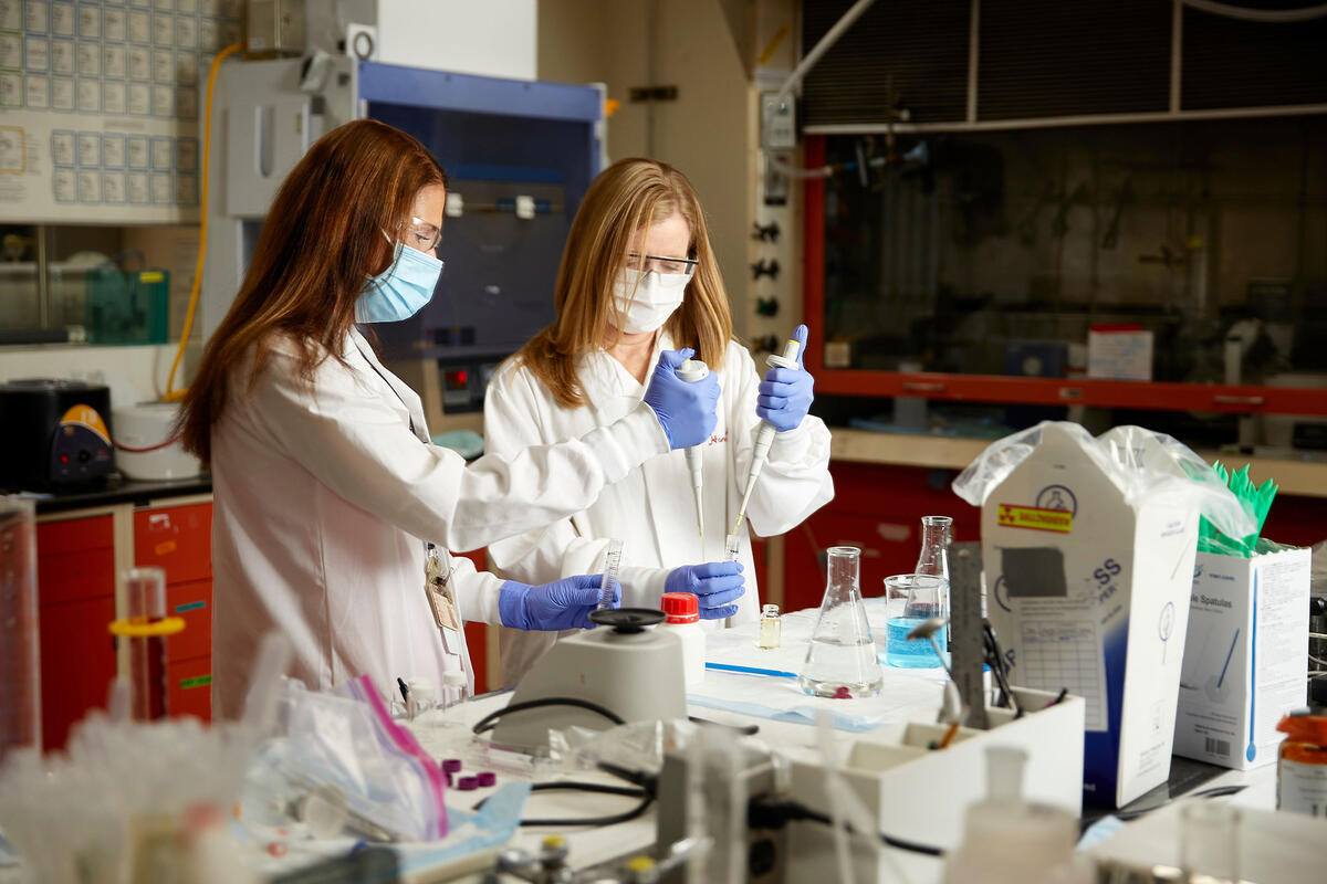 Two women working in the Radiochemistry laboratory.