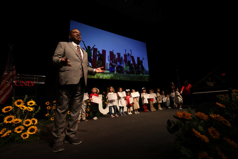 President Whitfield on state with preschool students holding pictures